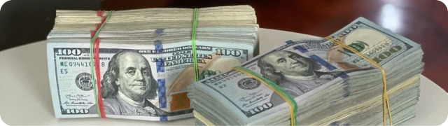 1750036533916-stack of money rounded