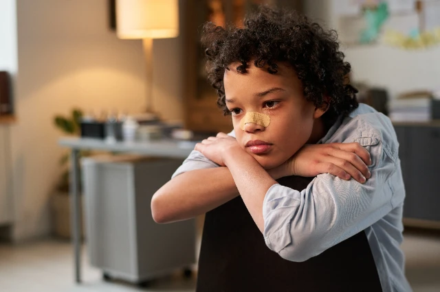 1751545915709-sulky-boy-in-psychologist-office-2025-05-17-22-35-05-utc